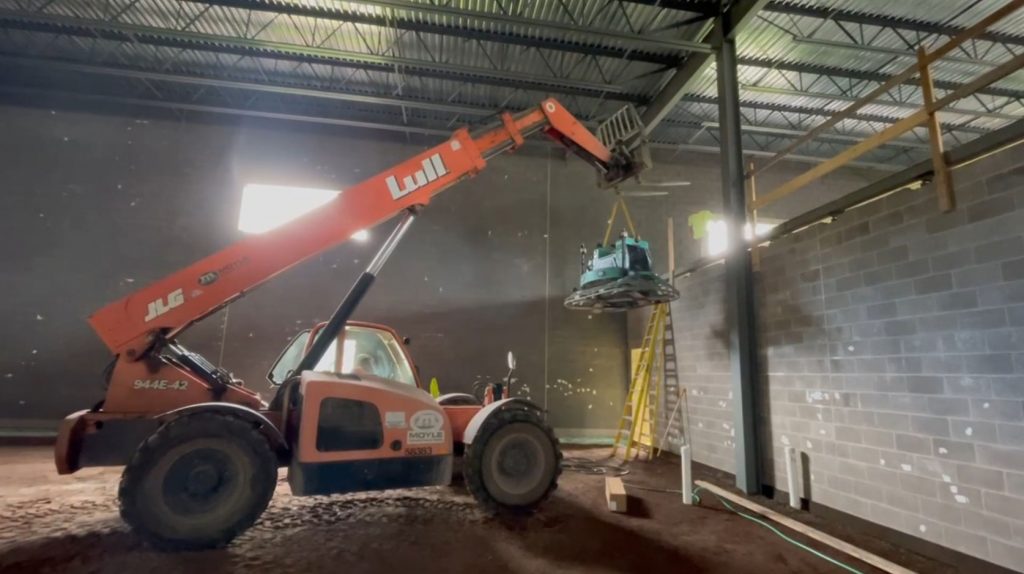 concrete floor construction of new Calumet Electronics building
